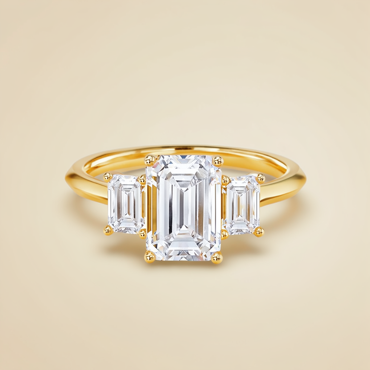 Ava Ring — Emerald Three-Stone Engagement Ring in 18k yellow gold